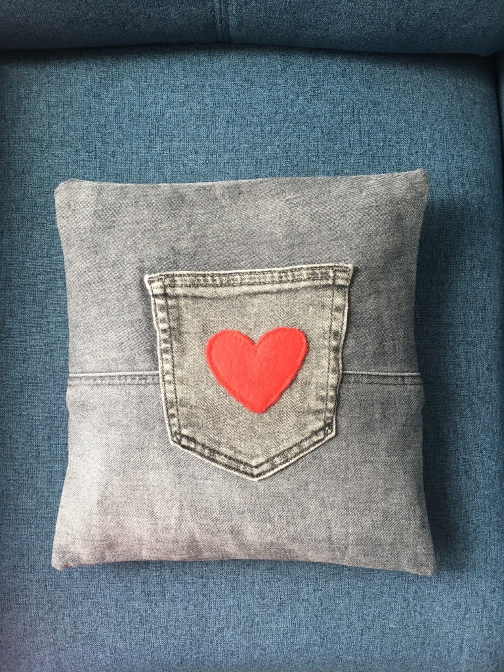 Hand sewn grey denim cushion cover with pocket